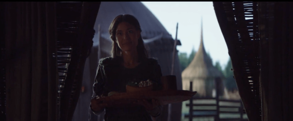 Omera taking care of the mandalorian and being a good host. 