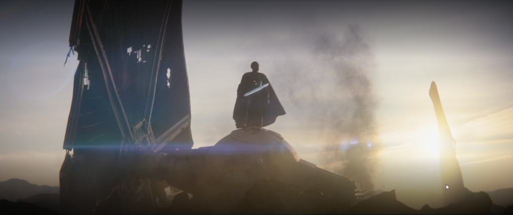 Gideon standing atop his TIE fighter with his Darksaber in hand. 