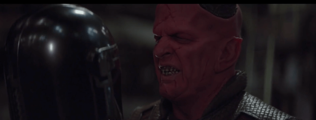 Burg the big red alien. 