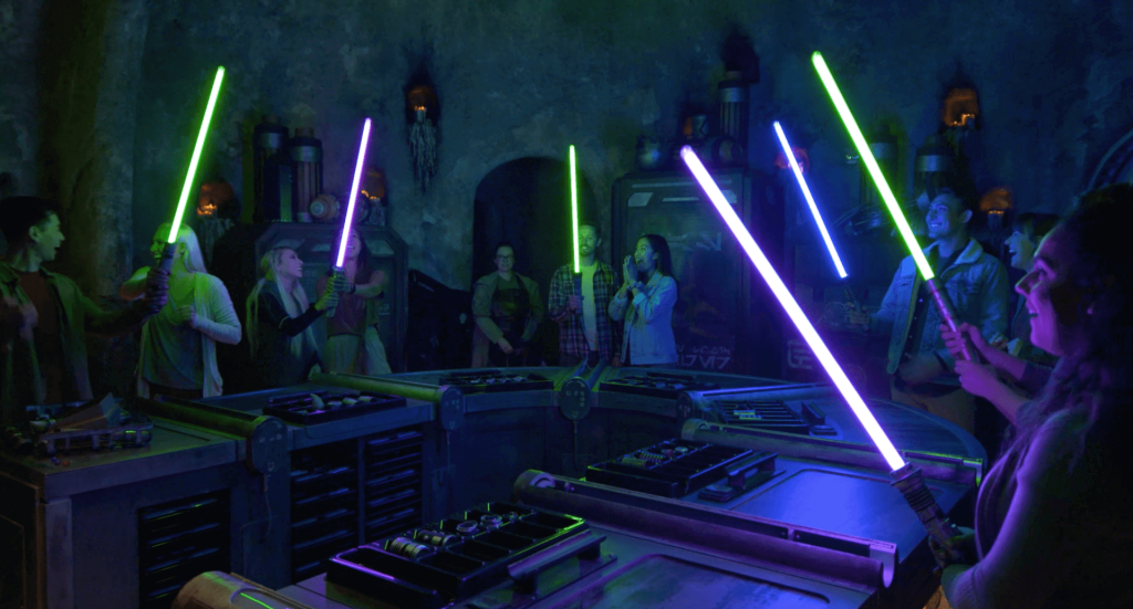 Savi's workshop is where you will be able to build your own lightsaber. It is rather expensive ($199.99) but the lightsaber quality is top notch. It is a great experience that allows you to choose from 4 different lightsaber themes, Peace and Justice, Power and Control, Elemental Nature, and Protection and Defense.